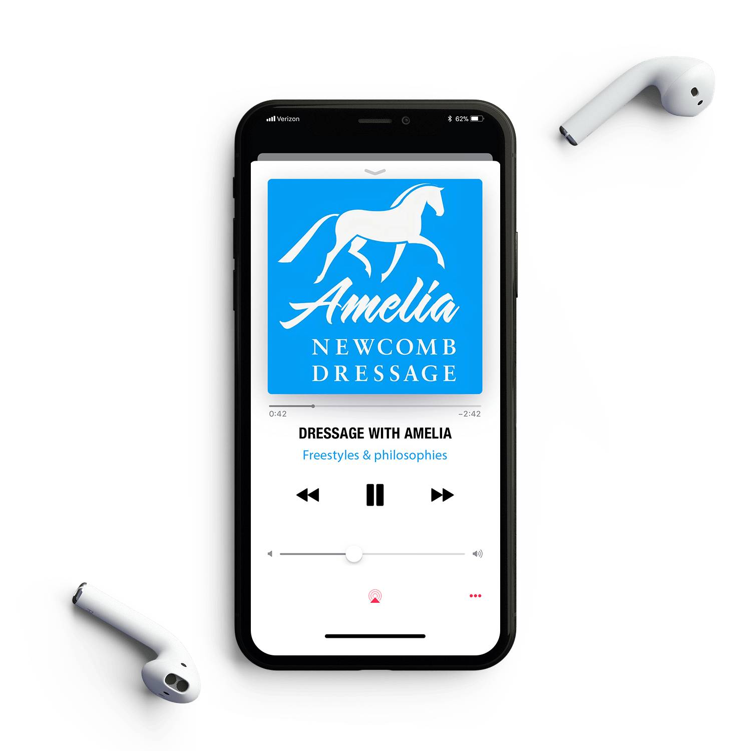 A smartphone on a white surface displays a podcast titled Dressage with Amelia by Amelia Newcomb Dressage, with two wireless earbuds placed nearby. The podcast cover features a horse silhouette on a blue background.