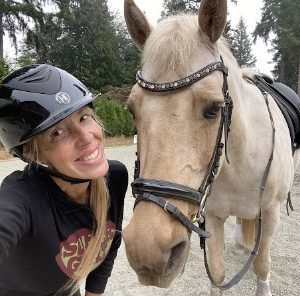 Ursula Ursula posing with her horse.