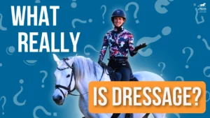 A smiling person in a helmet and floral top sits on a white horse against a blue background with question marks, capturing the elegance of dressage. Large text reads What really is dressage? with is dressage? highlighted in orange.
